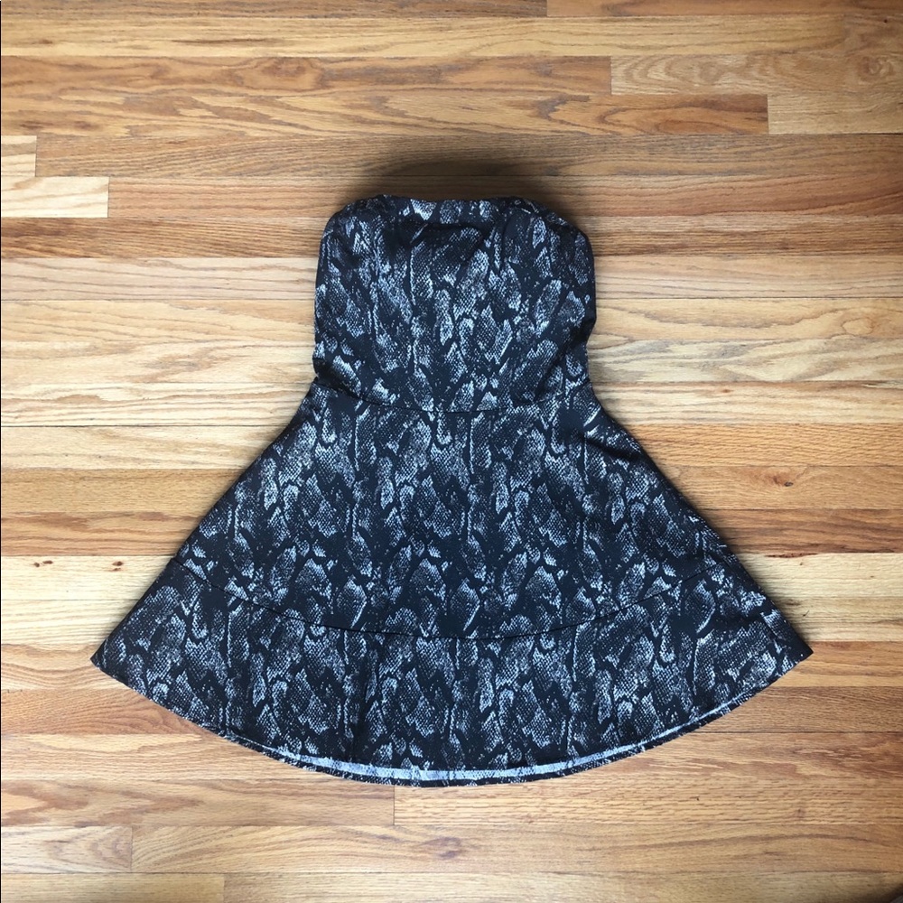 Black dress with gold snakeskin pattern